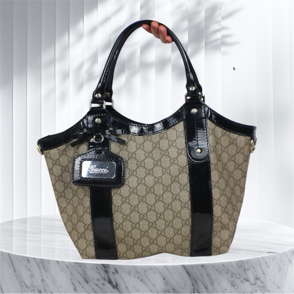 Gucci Handbags - Gucci Tote Black and Tan Women's Bag